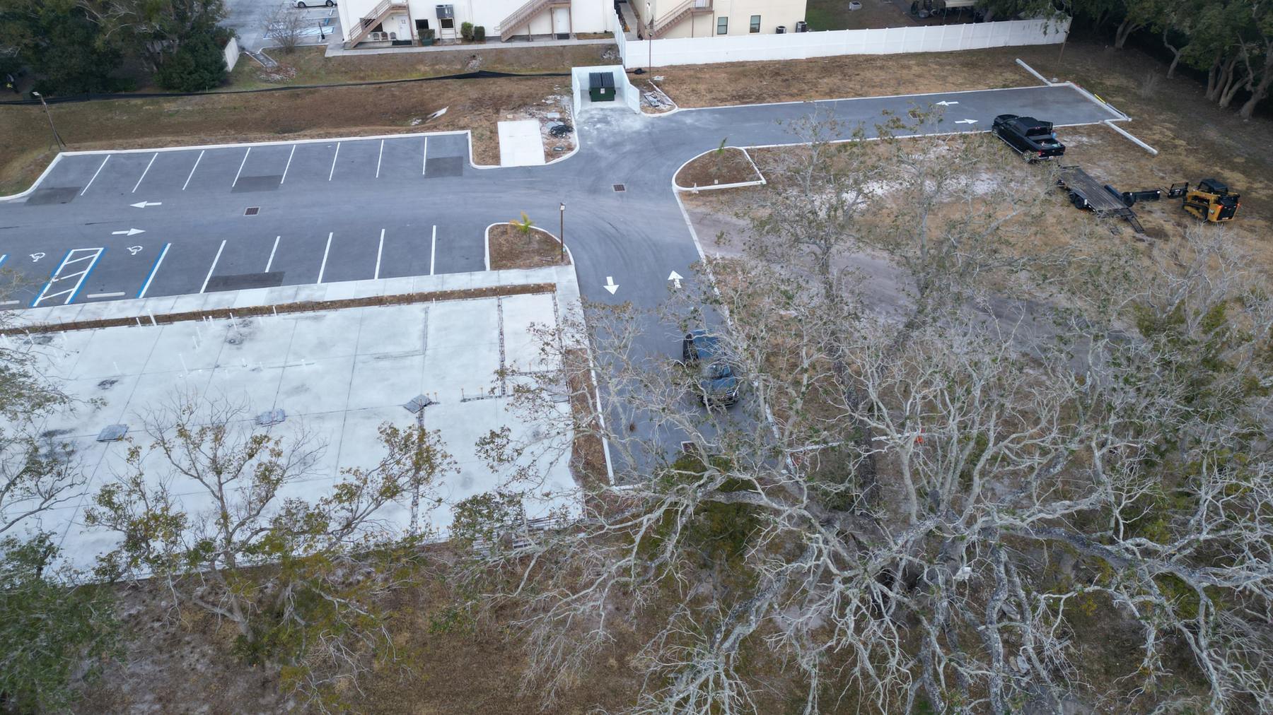 Aerial view of the new masjid site with the concrete slab poured and parking lot completed